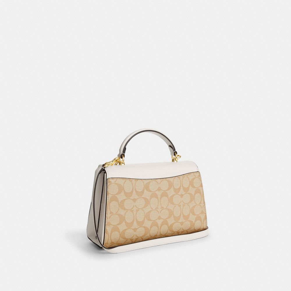 COACH®,Eliza Top Handle In Signature Canvas,,Angle View