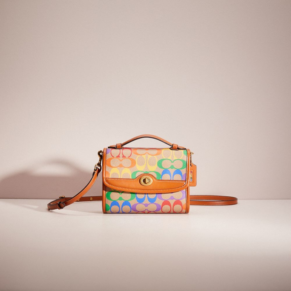 Restored Kip Turnlock Crossbody In Rainbow Signature Canvas