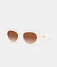 COACH®,PILLOW TABBY ROUND SUNGLASSES,Milky Ivory,Front View