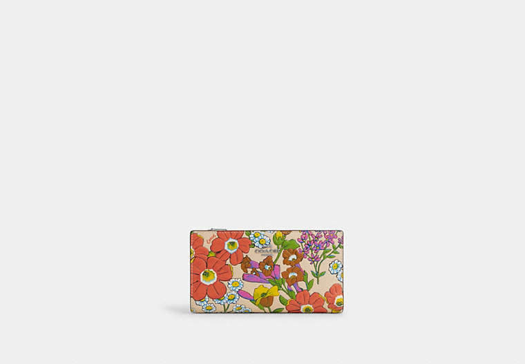 Shop Coach Outlet Slim Zip Wallet With Floral Print In White