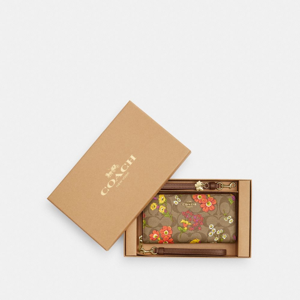 COACH®,BOXED LONG ZIP AROUND WALLET IN SIGNATURE CANVAS WITH FLORAL PRINT,Signature Canvas,Mini,Gold/Khaki Multi,Front View