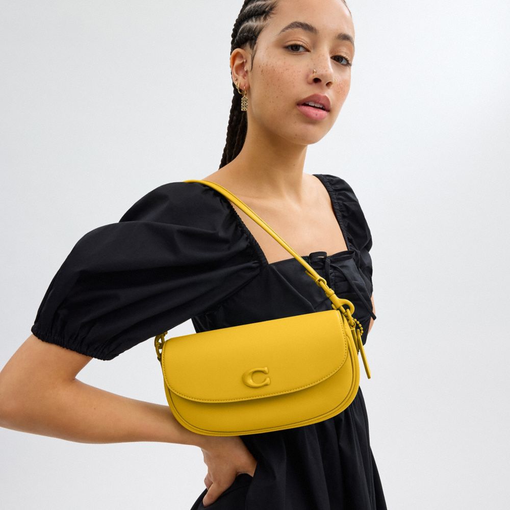 COACH®,Emmy Saddle Bag 23,Leather,Saddle Bag,Embossed,Logo,Metal,Pen Holder,Casual,Mustard,Detail View