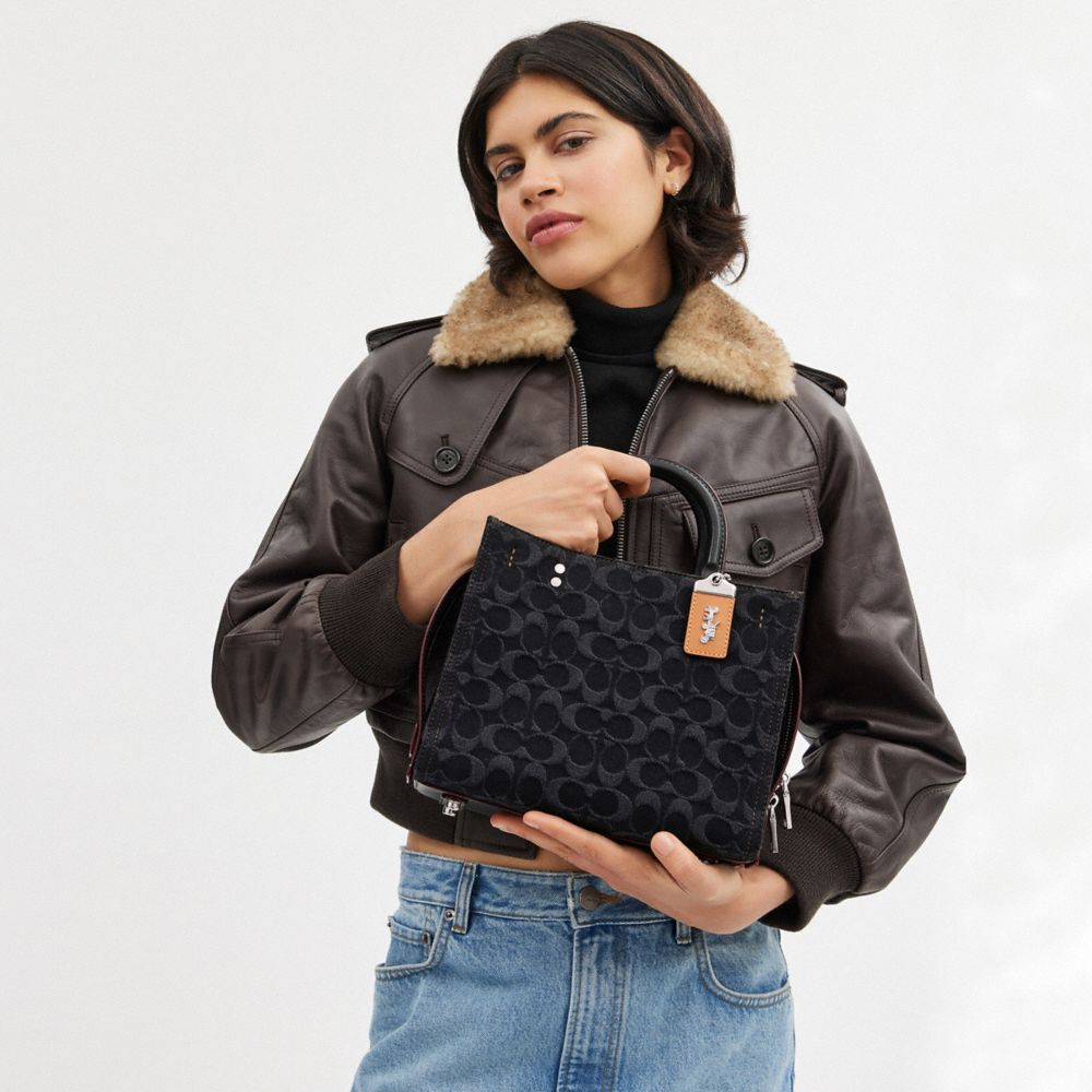 COACH®,Rogue Bag 25 In Signature Denim,Denim,Cotton,Satchel,Studded,Day Party,,Detail View