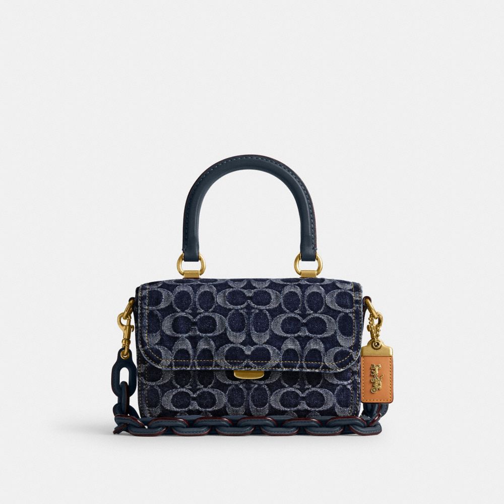 COACH®,ROGUE TOP HANDLE BAG IN SIGNATURE DENIM,Denim,Medium,Brass/Blue,Front View