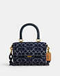 COACH®,ROGUE TOP HANDLE BAG IN SIGNATURE DENIM,Denim,Medium,Brass/Blue,Front View