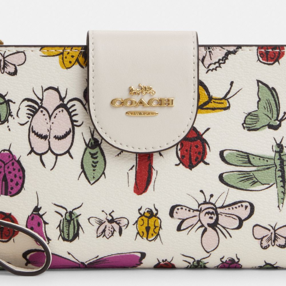 COACH®,PHONE WALLET WITH CREATURE PRINT,Novelty Print,Gold/Chalk Multi