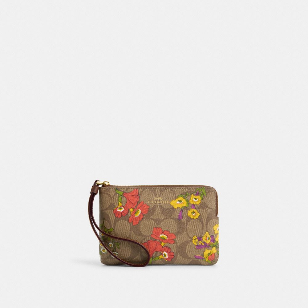 COACH®,CORNER ZIP WRISTLET IN SIGNATURE CANVAS WITH FLORAL PRINT,Signature Canvas,Gold/Khaki Multi,Front View