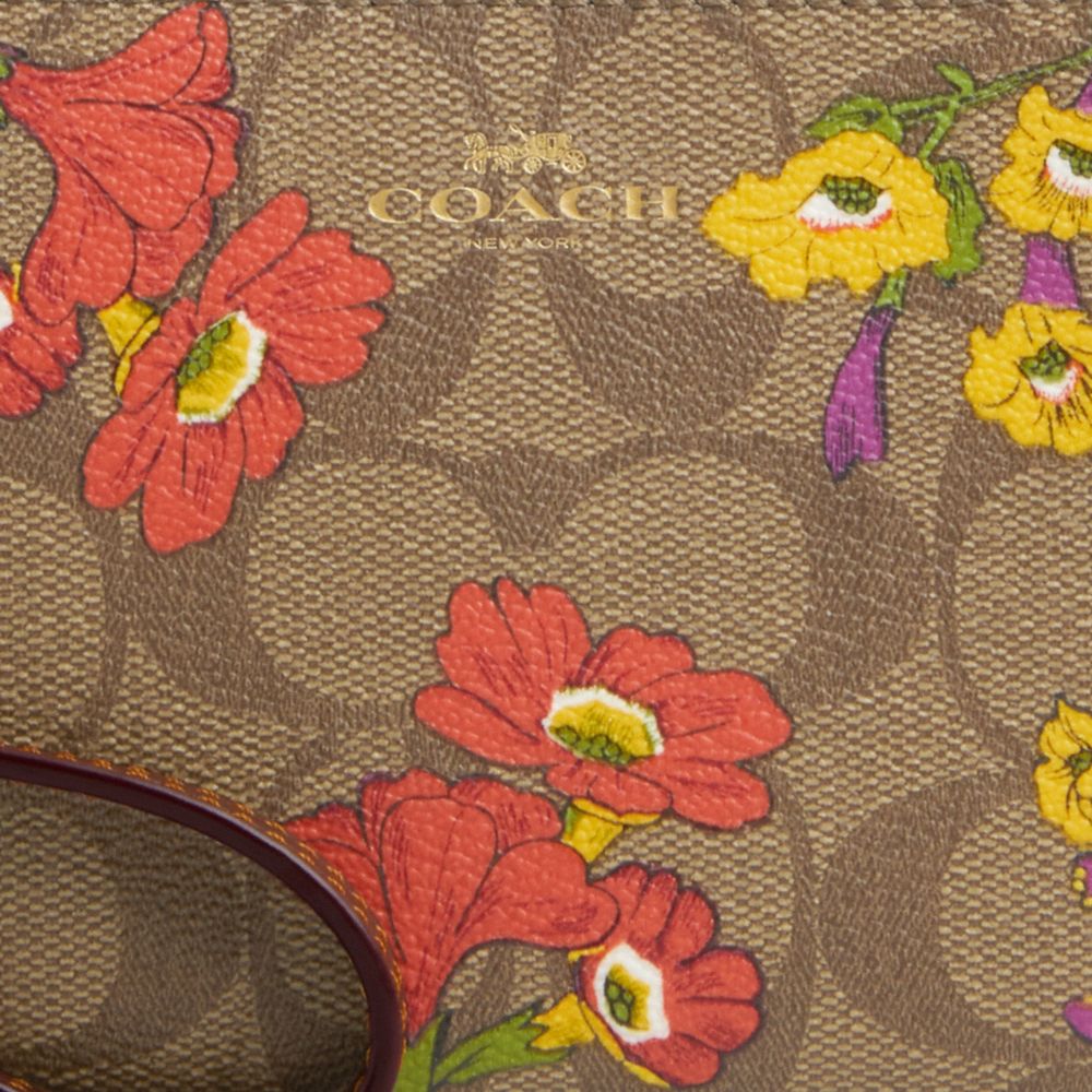 COACH®,WRISTLET AVEC FERMETURE ÉCLAIR D’ANGLE EN TOILE EXCLUSIVE À MOTIF FLORAL,pvc,Or/Kaki Multi