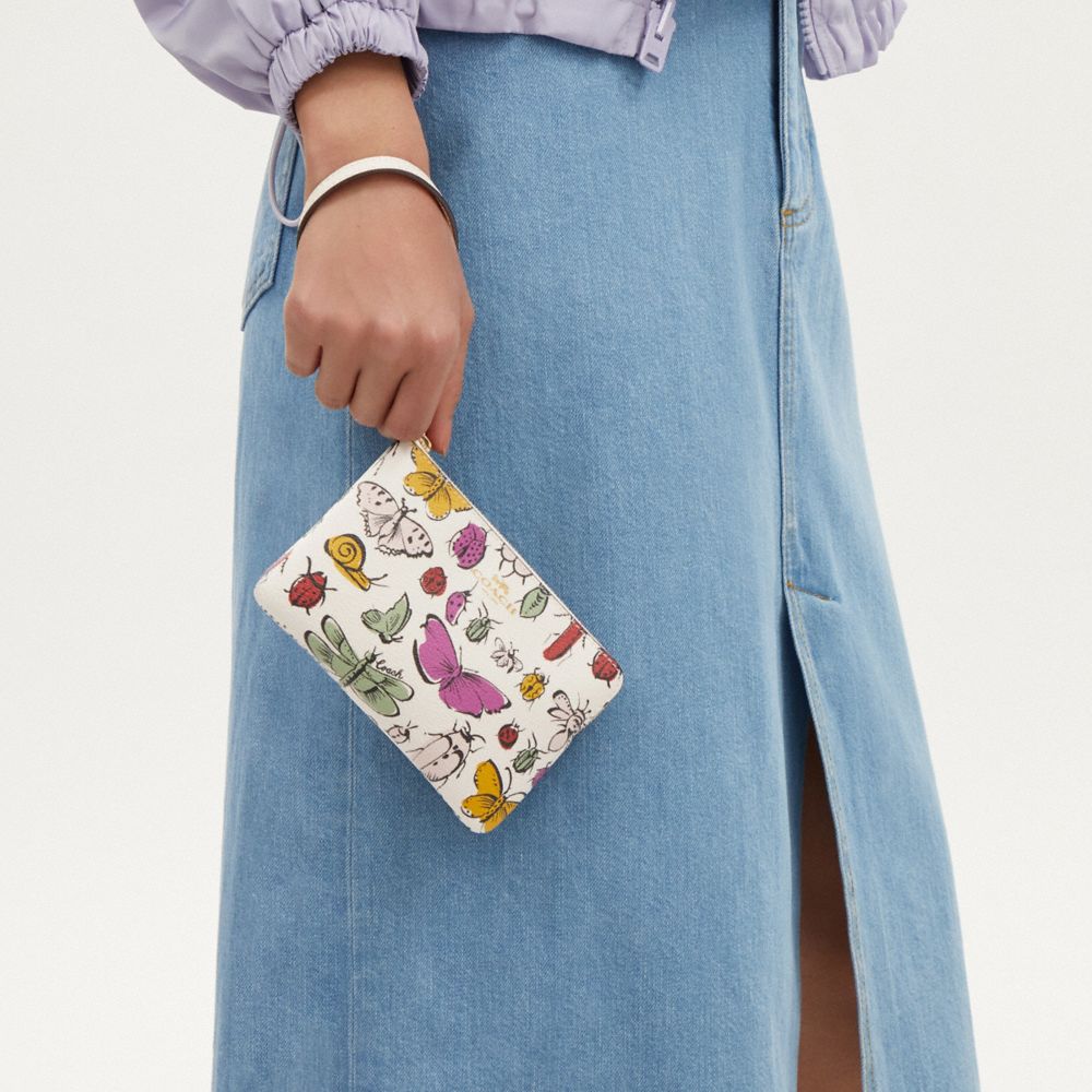 COACH®,Corner Zip Wristlet With Creature Print,Canvas,Wristlet,Gold Metal,Casual,White,Detail View