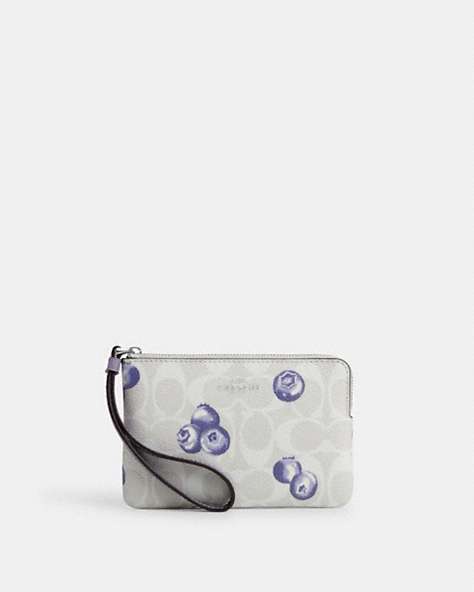 COACH®,CORNER ZIP WRISTLET IN SIGNATURE CANVAS WITH BLUEBERRY PRINT,pvc,Silver/Chalk/Light Violet,Front View