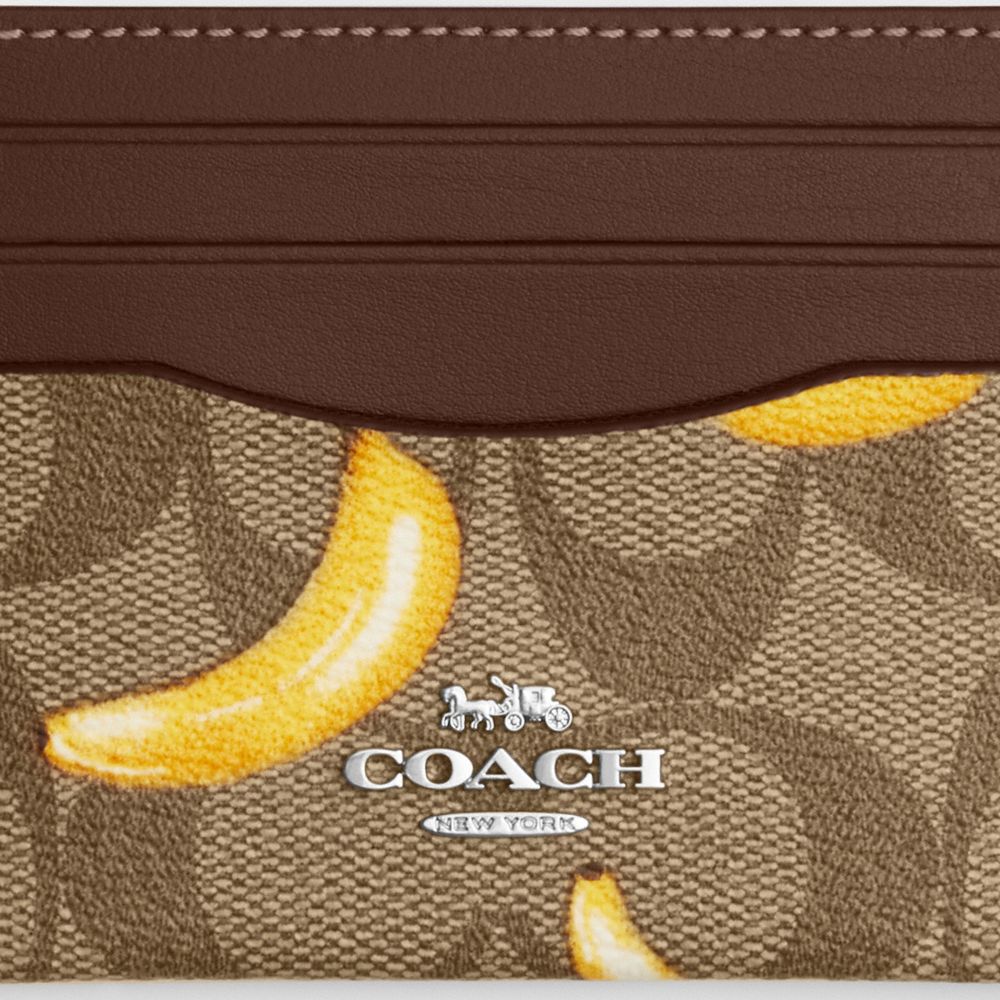 COACH®,SLIM ID CARD CASE IN SIGNATURE CANVAS WITH BANANA PRINT,Signature Canvas,Silver/Khaki/Dark Saddle