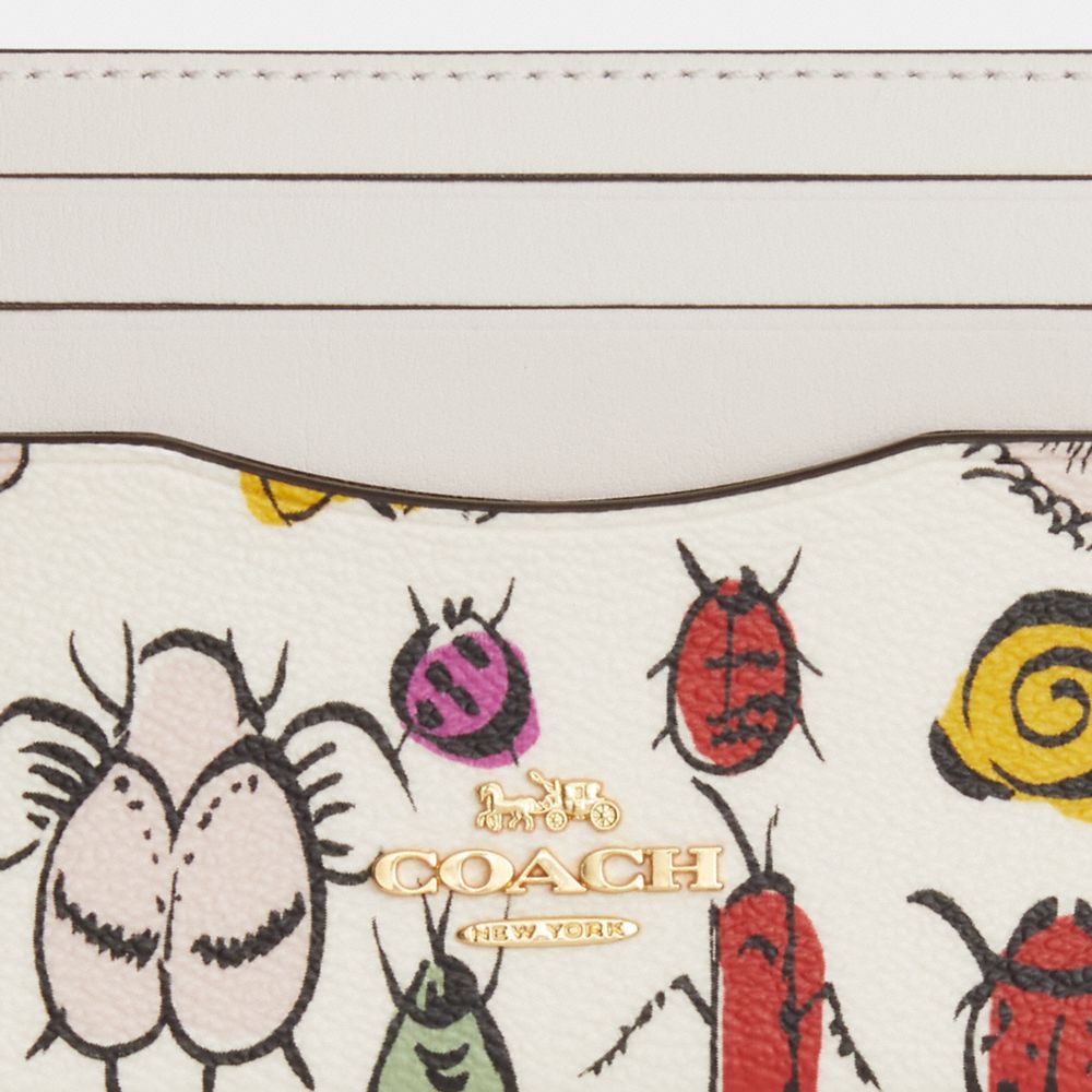 COACH®,SLIM ID CARD CASE WITH CREATURE PRINT,Novelty Print,Gold/Chalk Multi
