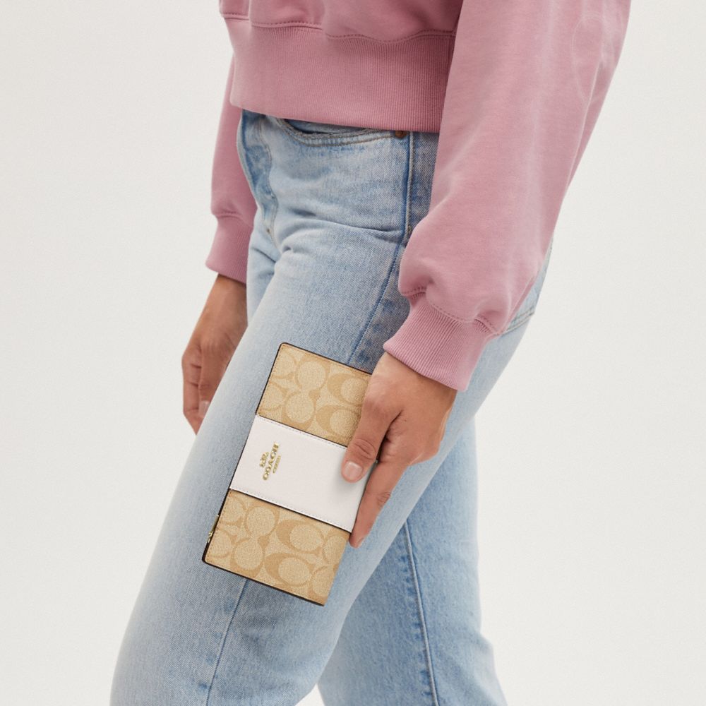 Signature canvas coach online wallet