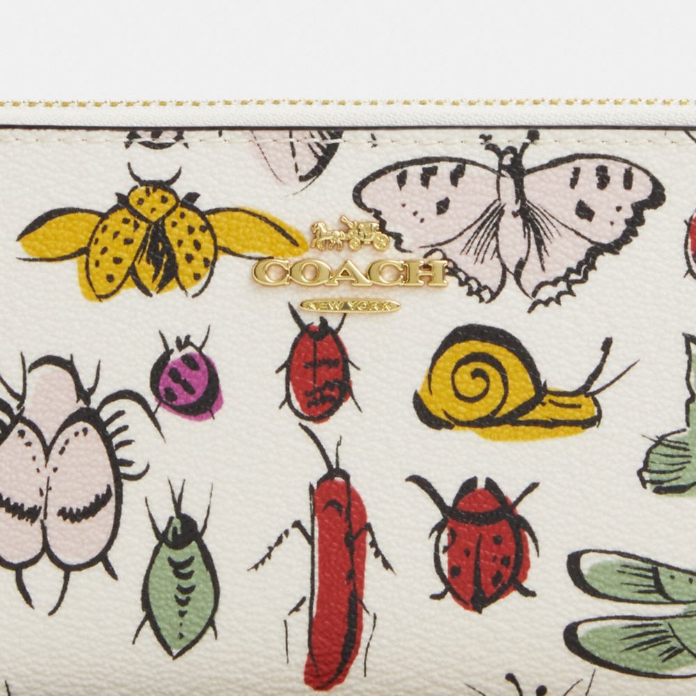 COACH®,LONG ZIP AROUND WALLET WITH CREATURE PRINT,Novelty Print,Mini,Gold/Chalk Multi