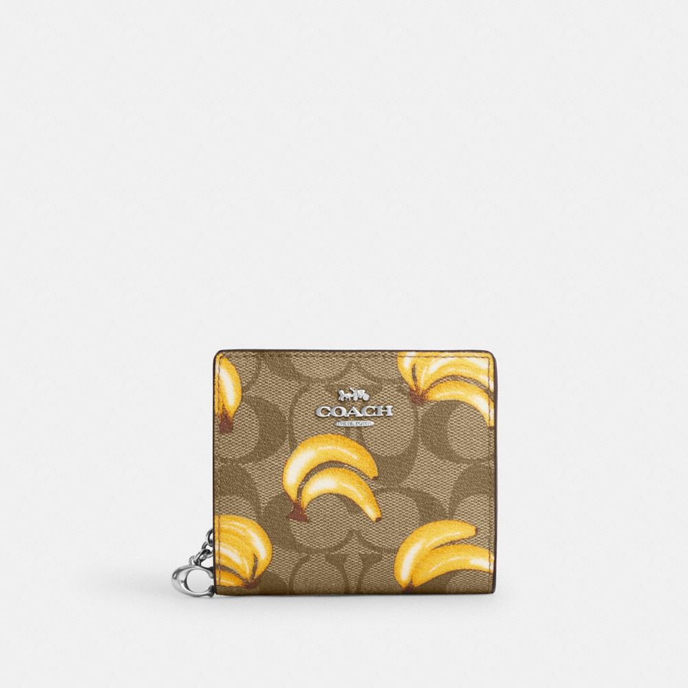 Shop Coach Outlet Snap Wallet In Signature Canvas With Banana Print In Brown