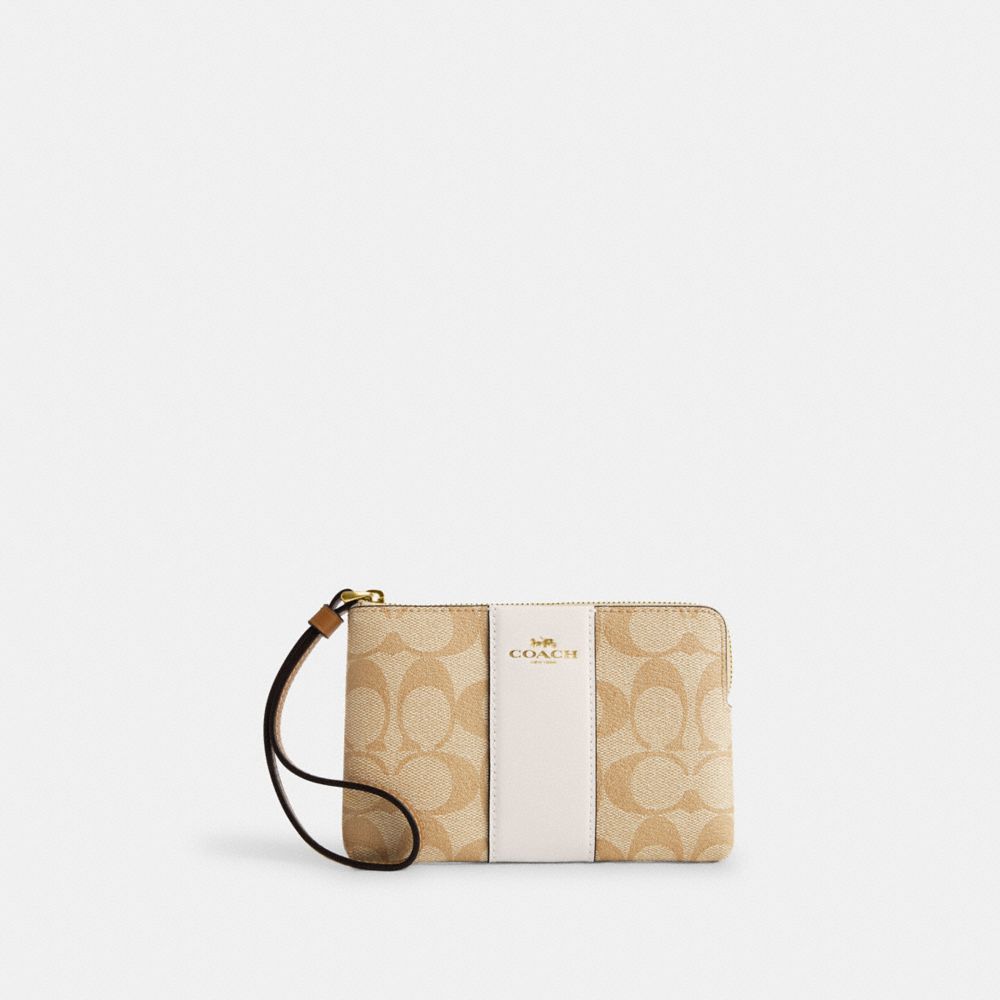 COACH®,CORNER ZIP WRISTLET IN SIGNATURE CANVAS WITH STRIPE,Signature Canvas,Im/Light Khaki/Chalk Lt Saddle,Front View