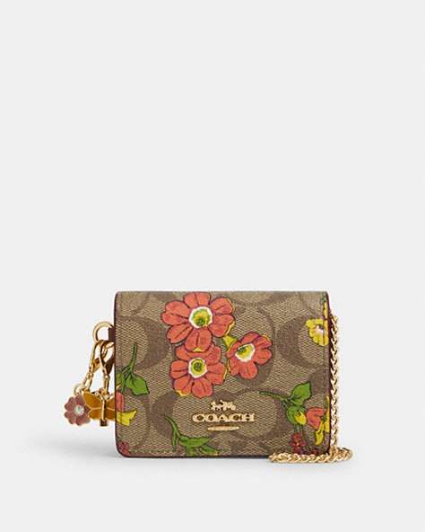 COACH®,BOXED MINI WALLET ON A CHAIN IN SIGNATURE CANVAS WITH FLORAL PRINT,pvc,Gold/Khaki Multi,Front View