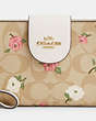 COACH®,PHONE WALLET IN SIGNATURE CANVAS WITH FLORAL PRINT,pvc,Gold/Light Khaki Chalk Multi