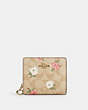 COACH®,SNAP WALLET IN SIGNATURE CANVAS WITH FLORAL PRINT,pvc,Gold/Light Khaki Chalk Multi,Front View