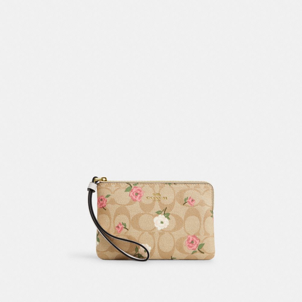 COACH®,CORNER ZIP WRISTLET IN SIGNATURE CANVAS WITH FLORAL PRINT,pvc,Gold/Light Khaki Chalk Multi,Front View