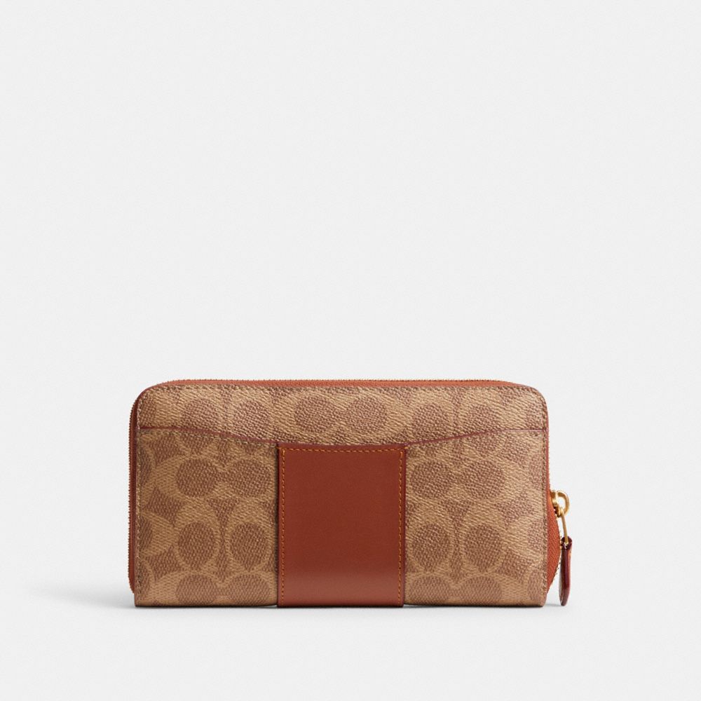 COACH®,アコーディオン ジップ ウォレット・カラーブロック シグネチャー キャンバス,長財布,ﾌﾞﾗｽ/ﾀﾝ ｷｬﾗﾒﾙ