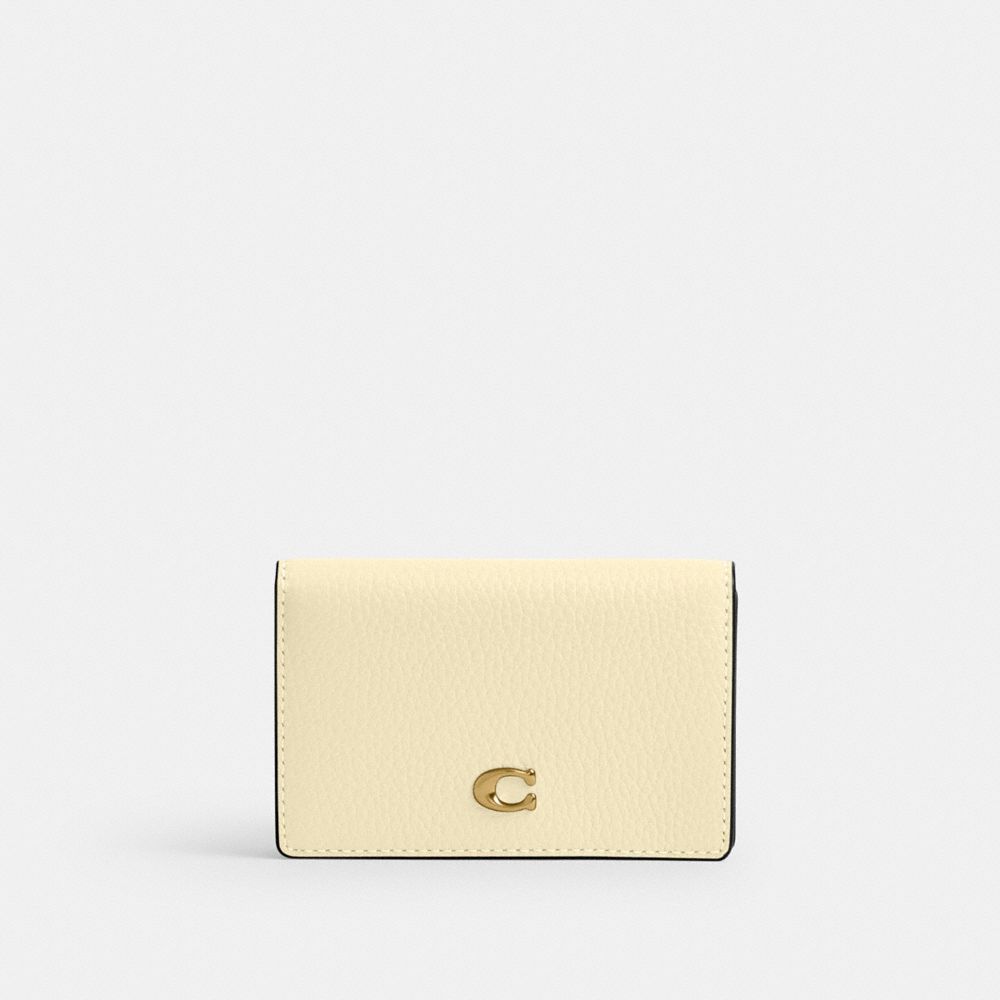 COACH®,エッセンシャル ビジネス カード ケース,カード ケース＆定期入れ＆名刺入れ,ﾌﾞﾗｽ/ﾑｰﾝﾗｲﾄ