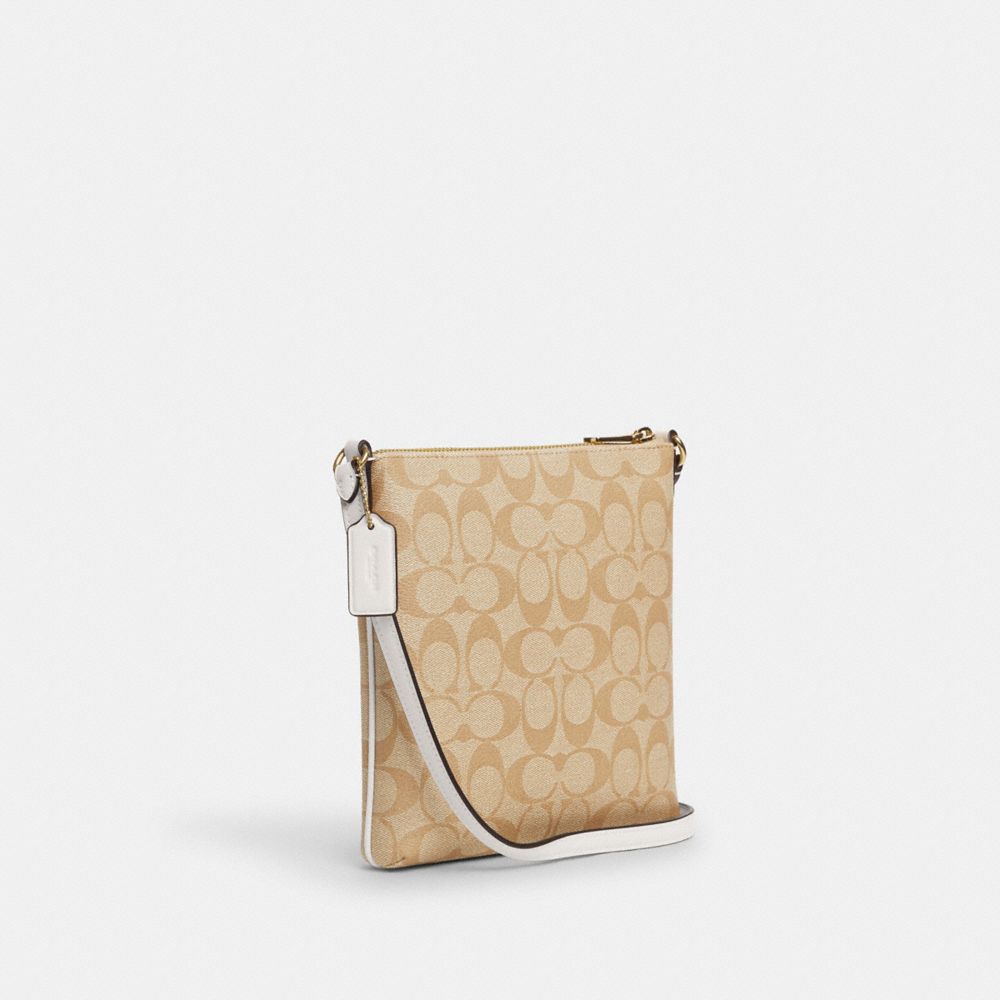 COACH®,Mini Rowan File Bag In Signature Canvas,Canvas,Leather,Crossbody,Logo,Casual,Beige,Angle View