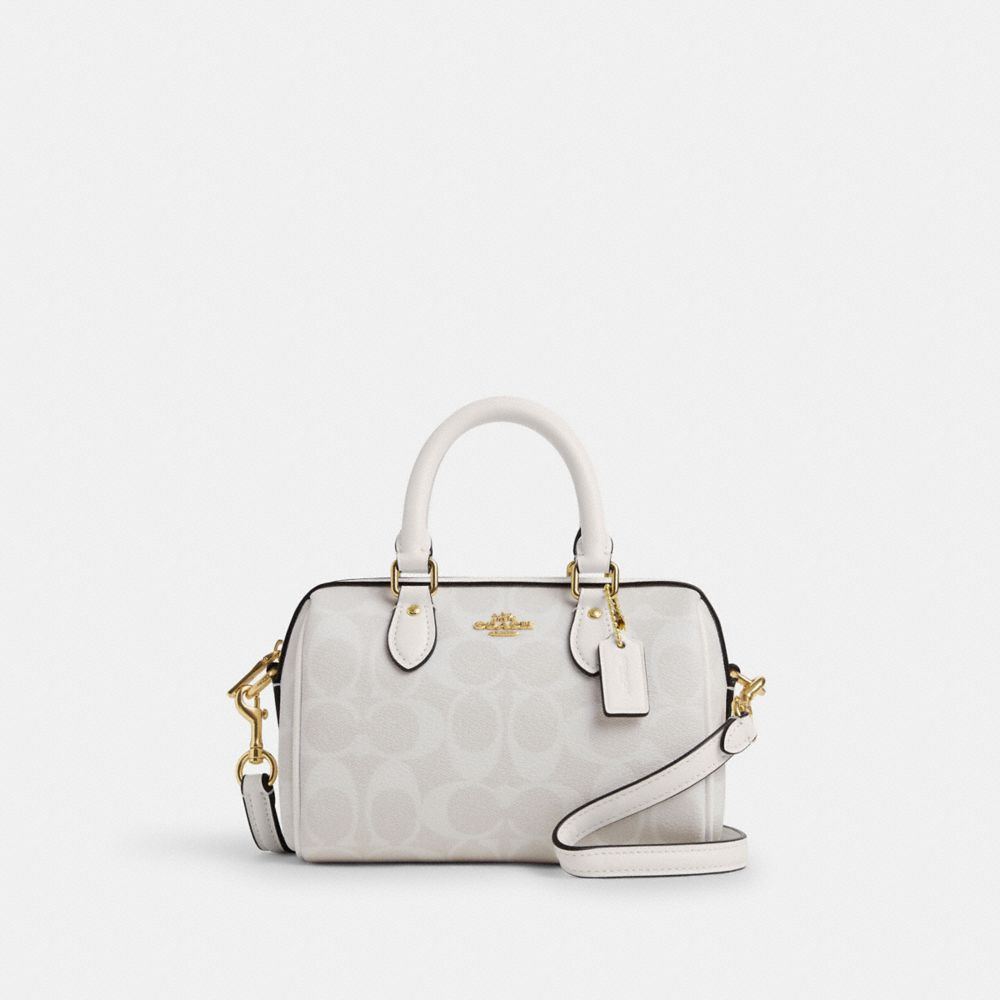 Shop Coach Outlet Mini Rowan Crossbody In Signature Canvas In White