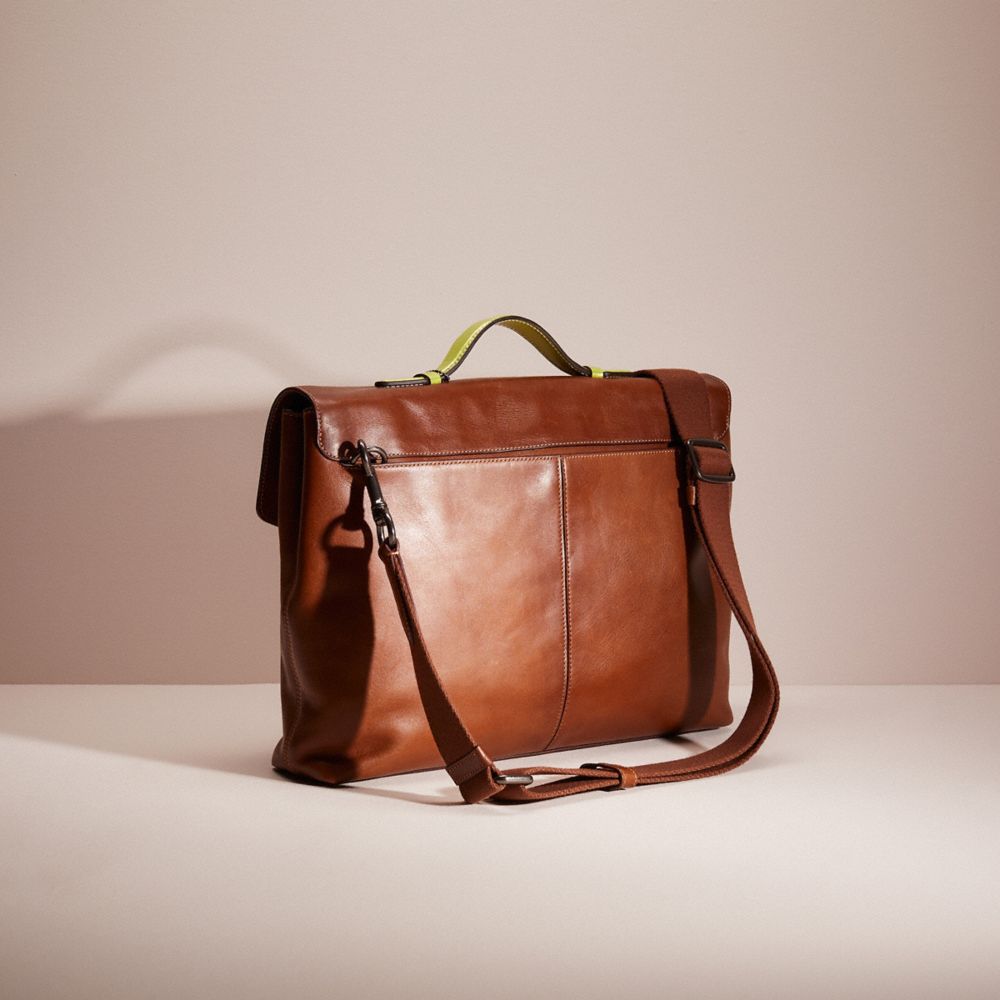 COACH®,UPCRAFTED METROPOLITAN SOFT PUSH LOCK BRIEF,Leather,Medium,Gunmetal/Saddle,Angle View