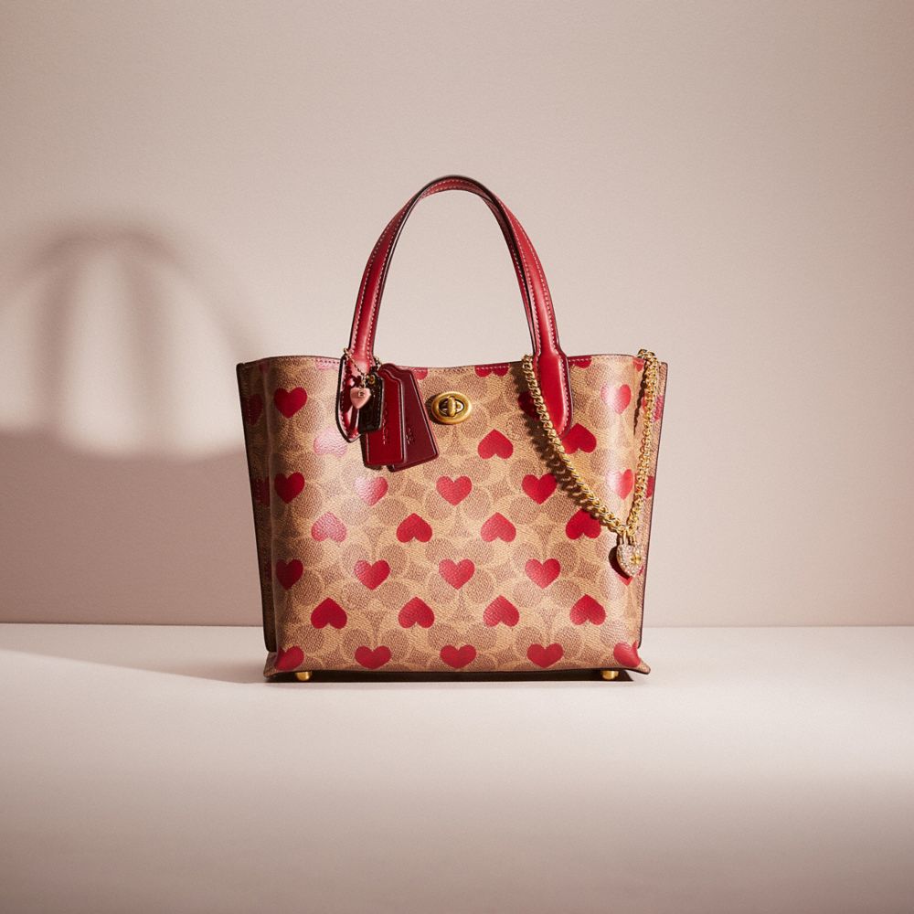 COACH Restored Willow Tote 24 In Signature Canvas With Heart Print in Pink