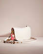 COACH®,UPCRAFTED SWINGER BAG WITH CHAIN,Glovetanned Leather,Small,Hello Summer,Brass/Chalk,Angle View