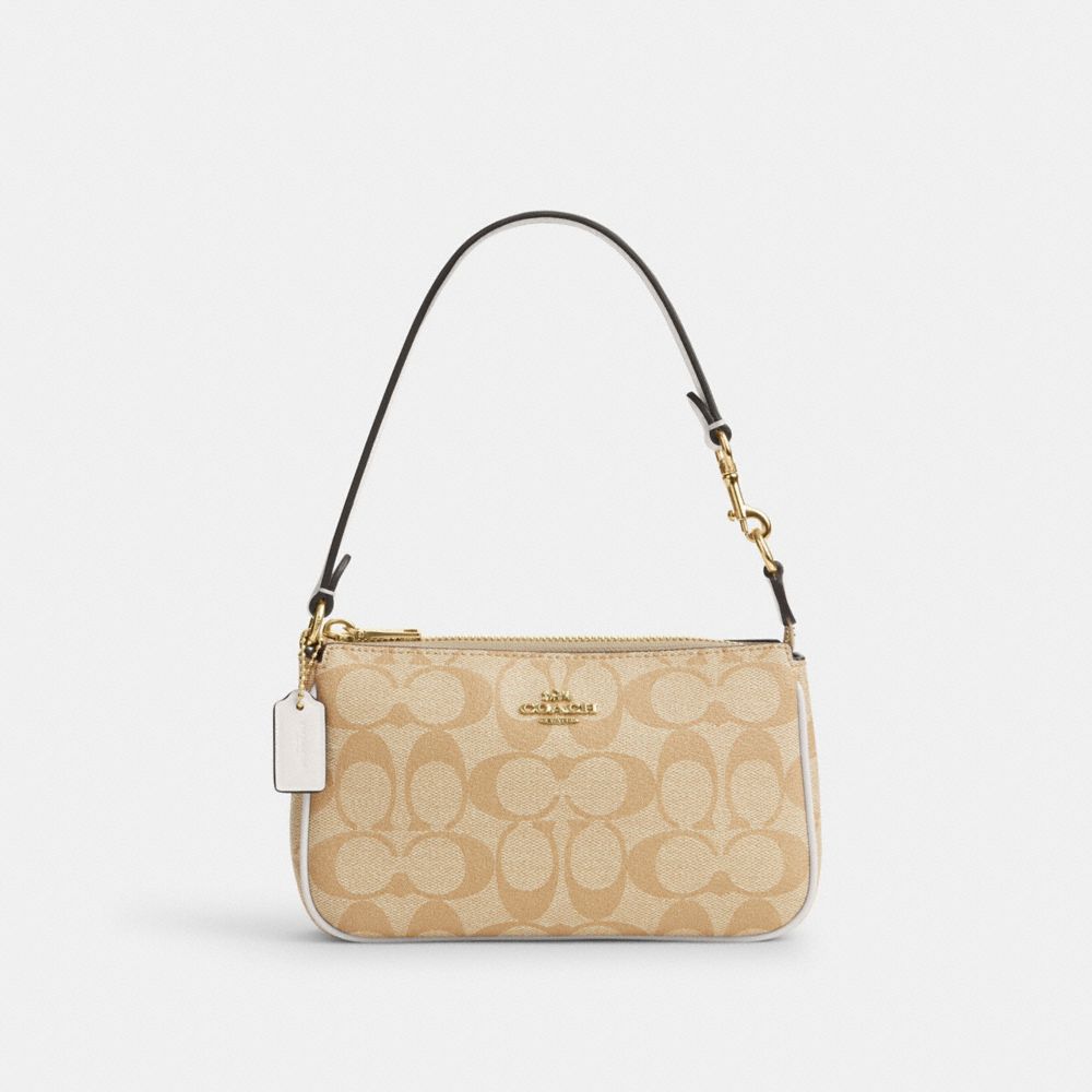 Shop Coach Outlet Nolita 19 In Signature Canvas In Beige