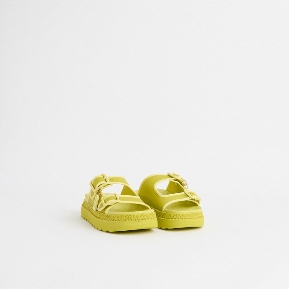 COACH®,Restored Lucy Sandal,Rubber,Slides,Piping,Sustainable,Cushioned,Water Friendly,Pool,Casual,Green,Angle View