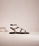 COACH®,RESTORED HADDIE GLADIATOR SANDAL IN SNAKESKIN,Snakeskin Leather,Natural,Front View