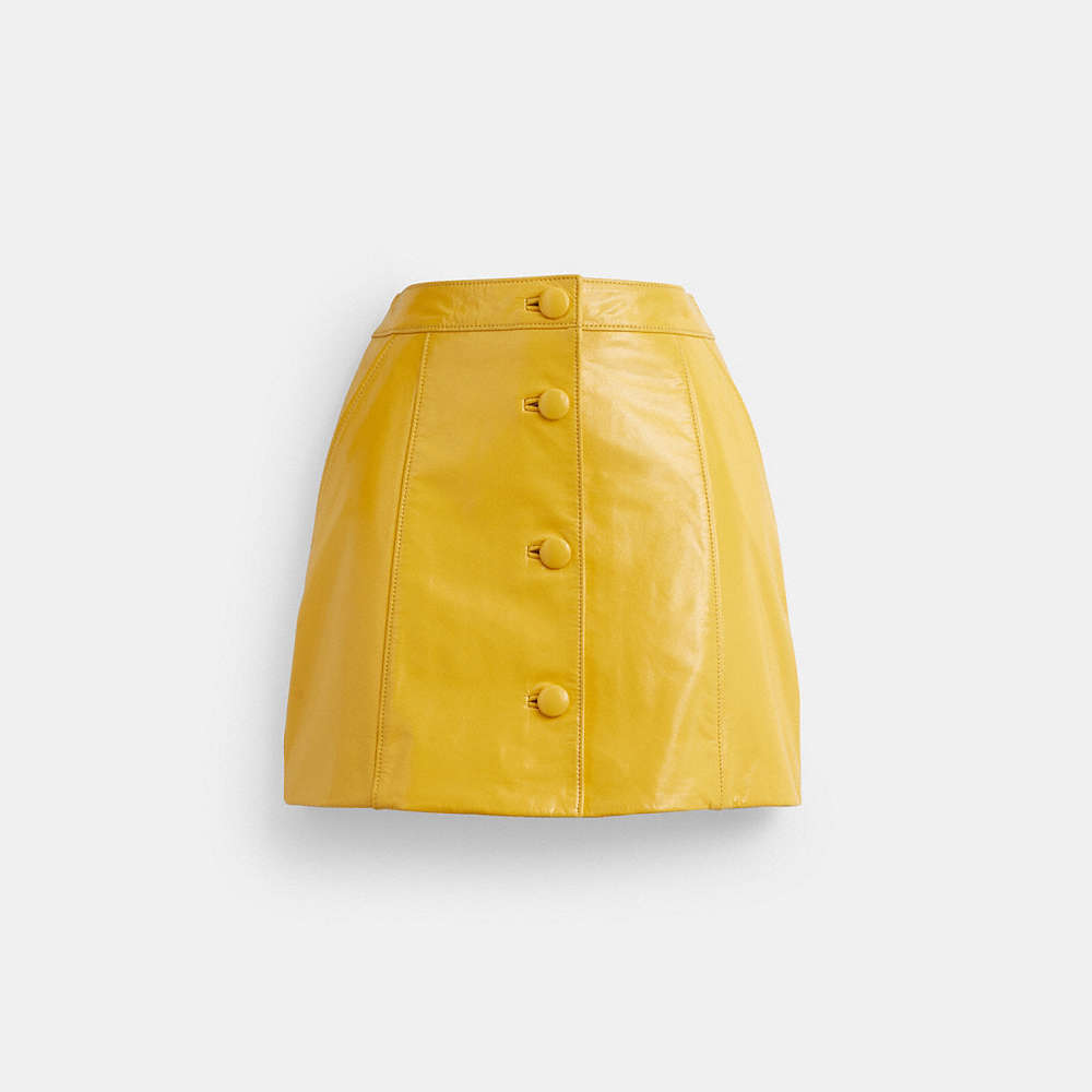 Coach Patent Leather Mini Skirt In Yellow
