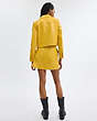 COACH®,PATENT LEATHER MINI SKIRT,Yellow,Scale View