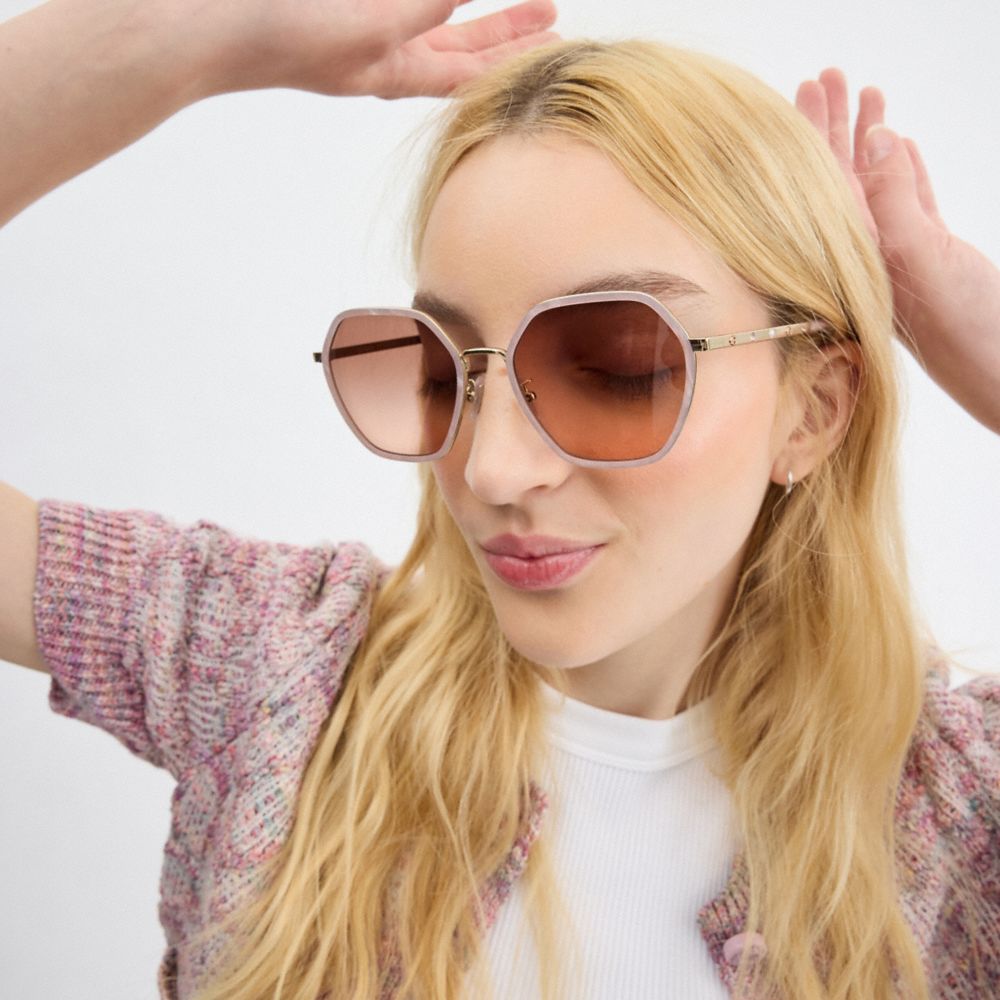 COACH®,Embellished Narrow Metal Hexagon Sunglasses,Hexagon,Logo,Rhinestones,Adjustable Nose Pads,Casual,Blush,Angle View
