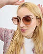 COACH®,EMBELLISHED NARROW METAL HEXAGON SUNGLASSES,Pearlized Pink,Angle View
