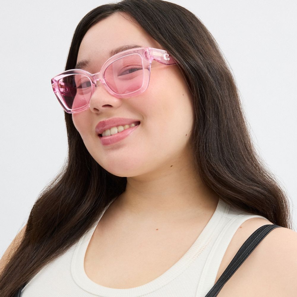 COACH®,JELLY TABBY SQUARE CAT EYE SUNGLASSES,Transparent Pink,Angle View