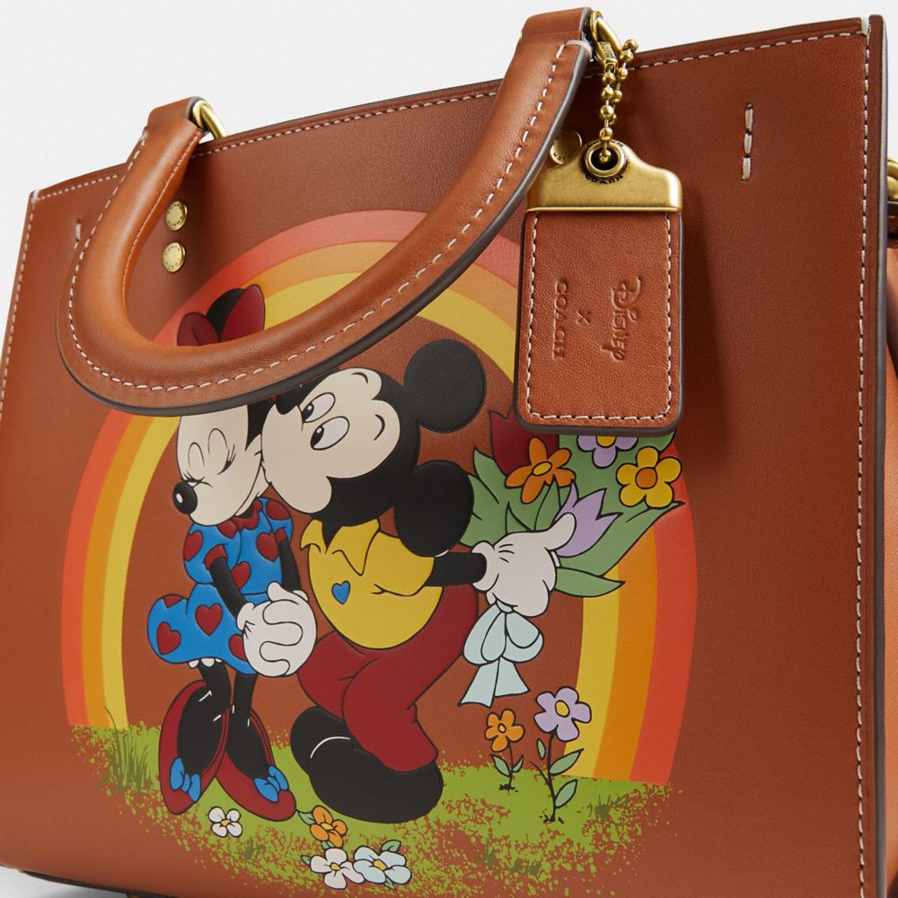Coach Disney X  Rogue Bag 25 With Mickey Mouse And Minnie Mouse In Brass/burnished Amber Multi