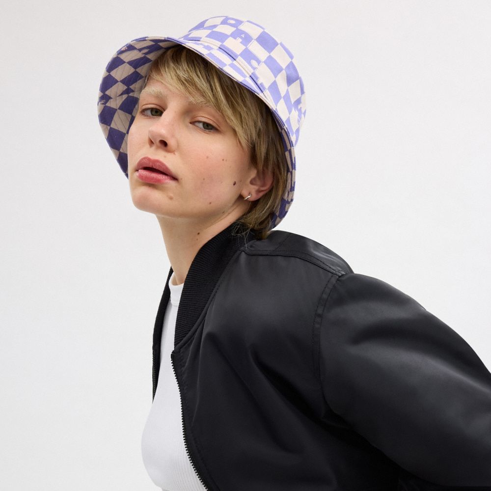 COACH®,CHECKERBOARD PRINT BUCKET HAT,Cream/Light Violet,Angle View