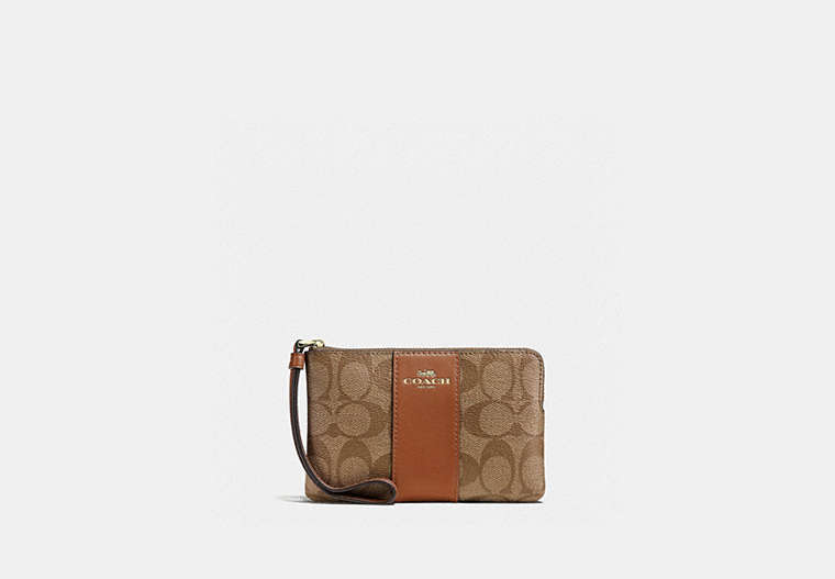 Coach Outlet Corner Zip Wristlet In Signature Canvas In Brown
