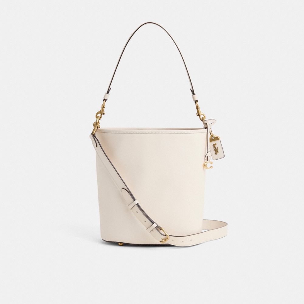 Coach Restored Dakota Bucket Bag In Brass/chalk