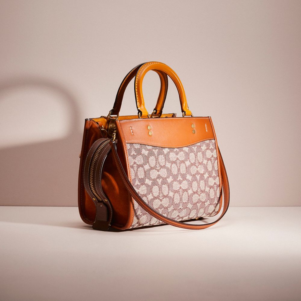 COACH®,UPCRAFTED ROGUE 25 IN SIGNATURE TEXTILE JACQUARD,School Spirit,Brass/Cocoa Burnished Amb,Angle View