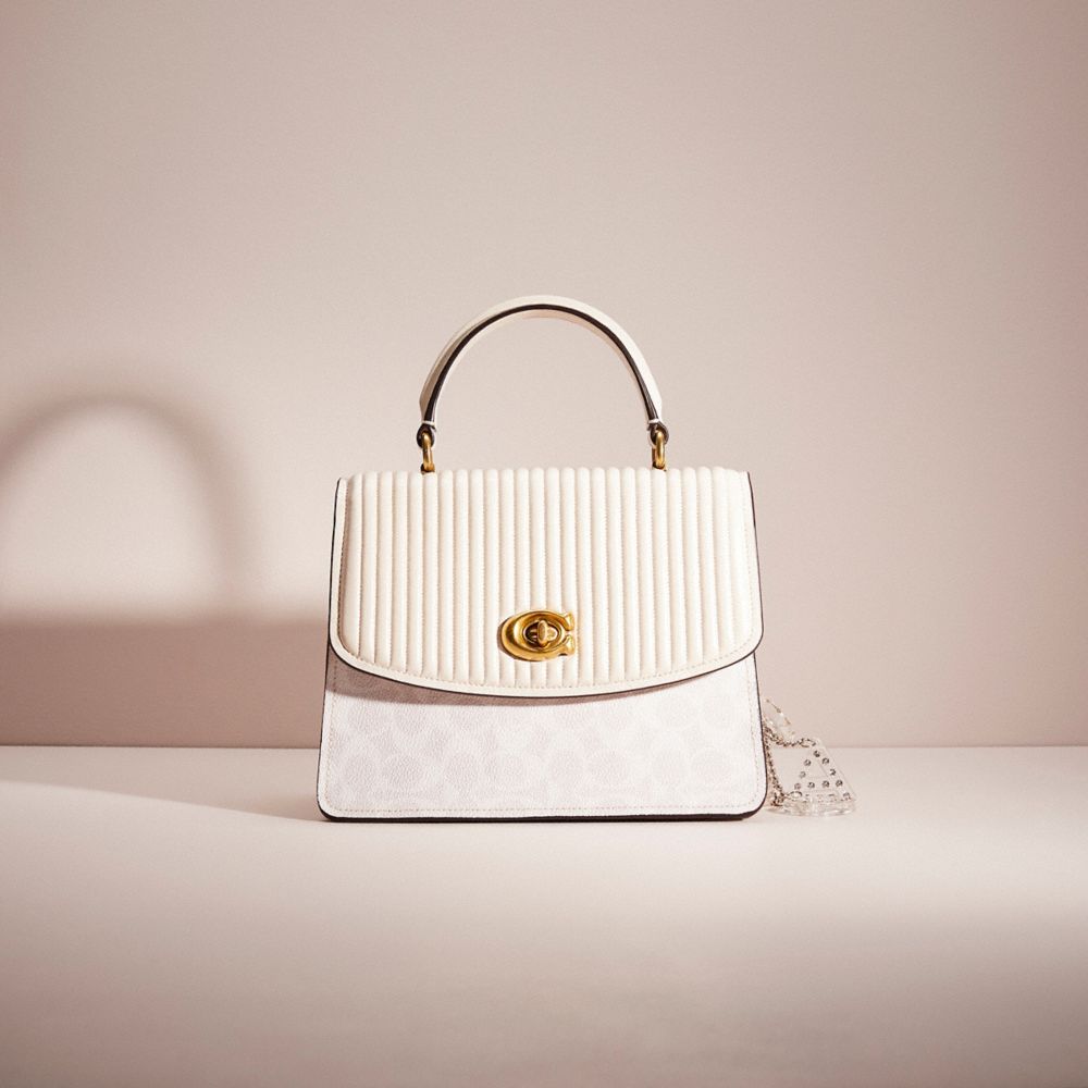 Coach parker best sale bag white