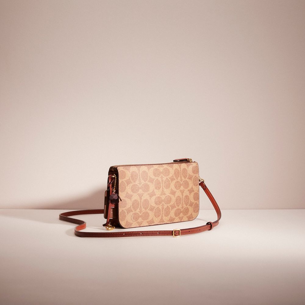 COACH®,Upcrafted Noa Pop Up Messenger In Signature Canvas,Brown,Angle View