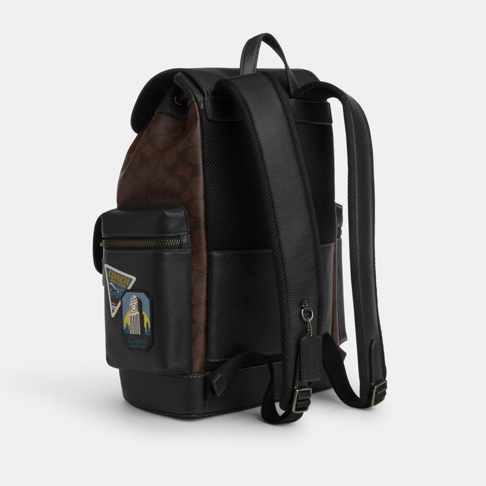 COACH®,SPRINT BACKPACK IN SIGNATURE CANVAS WITH TRAVEL PATCHES,Signature Canvas,X-Large,Gunmetal/Mahogany Multi,Angle View