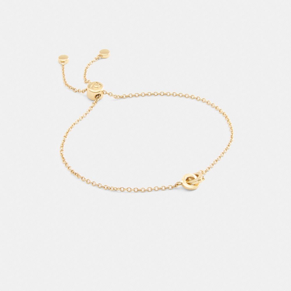 COACH®,INTERLOCKING SLIDER BRACELET,Metal,Gold,Front View image number 0