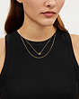 COACH®,DELICATE INTERLOCKING LAYERED NECKLACE,Metal,Gold,Detail View