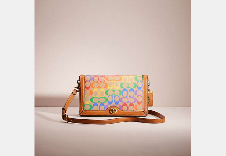 COACH®,RESTORED RILEY IN SIGNATURE CANVAS,Brass/Tan Penny Multi,Front View